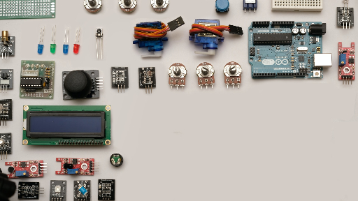assorted-color capacitors on white surface